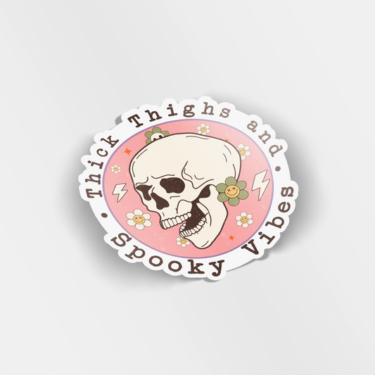 thick thighs and spooky vibes vinyl sticker